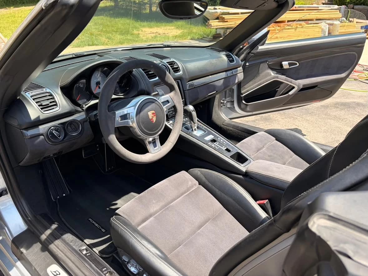 Interior of the same 2015 Porsche Boxster GTS after detailing